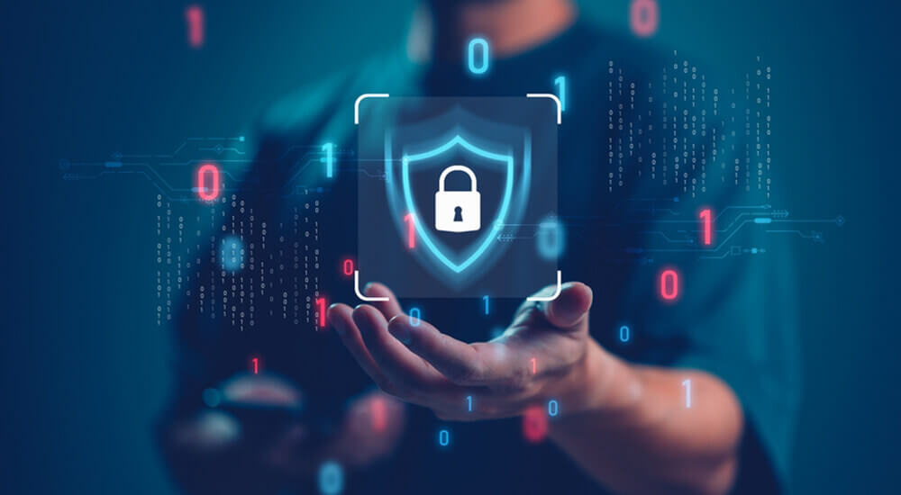 The image shows a person holding a digital shield with a padlock icon, symbolizing robust data security. For Prima Consulting's Delta IFRS 17 Software, it highlights the enhanced data security features, including geo-restrictions, IP restrictions, end-to-end SSL encryption, and secure private cloud deployment. The software provides role-based access control to ensure users access only necessary information and functions. Additionally, it maintains a comprehensive audit trail, recording all system activities, user interactions, data access, and changes, ensuring the highest level of data security.