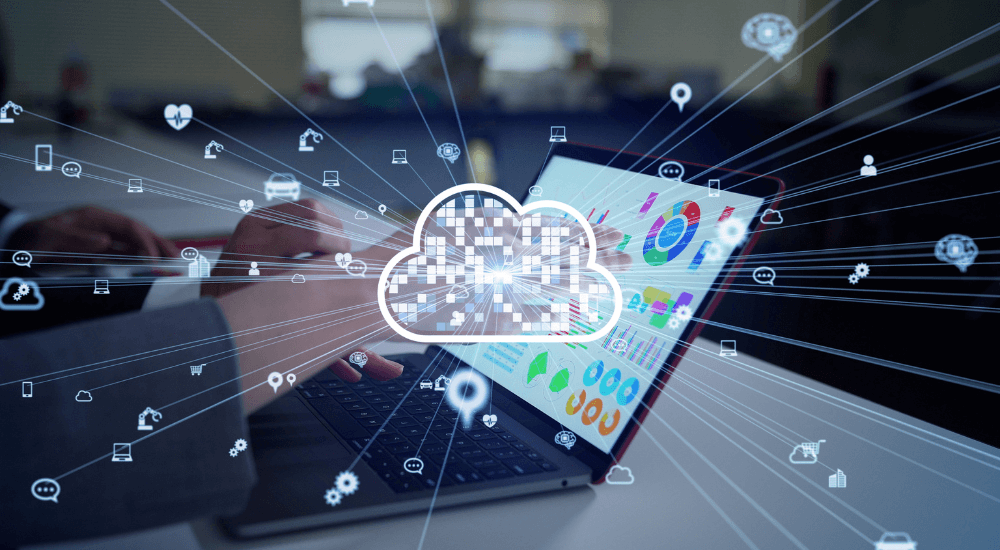A person working on a laptop with cloud computing icons, representing ARK9 EIR Financial Reporting Software's scalable cloud-based deployment.