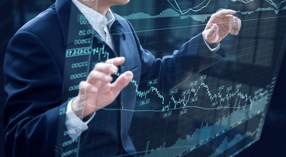 A businessman interacting with financial data on a digital screen, showcasing the capabilities of ARK9 EIR IFRS 9 compliance software.