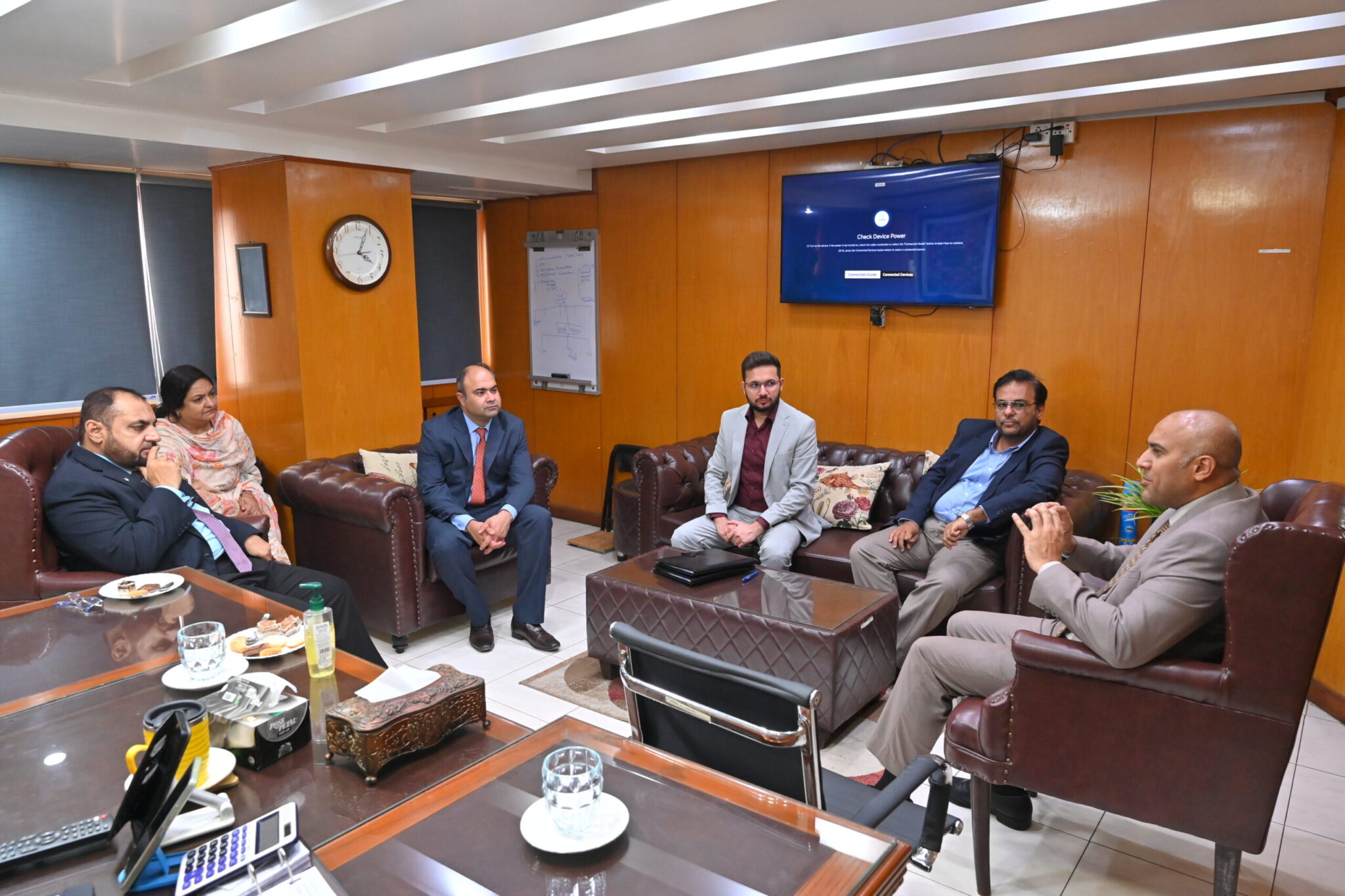 Representatives from Shaheen Insurance and Prima Consulting during a meeting at Shaheen Complex to discuss the IFRS 17 implementation.